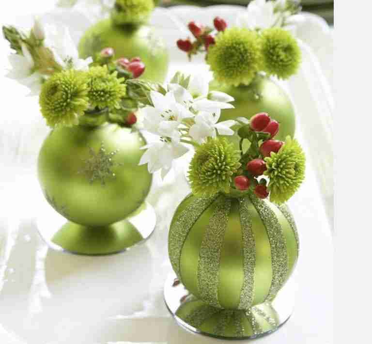 Green christmas ordament with flowers inside