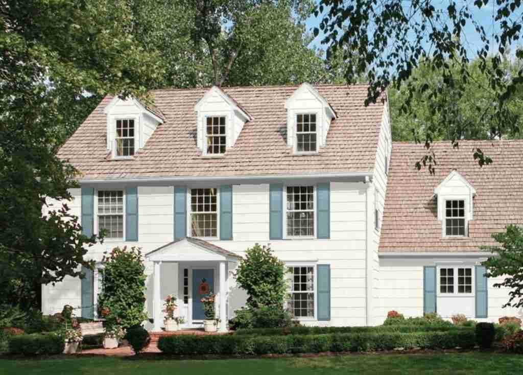 exterior paint color combinations images. white house with blue trim.