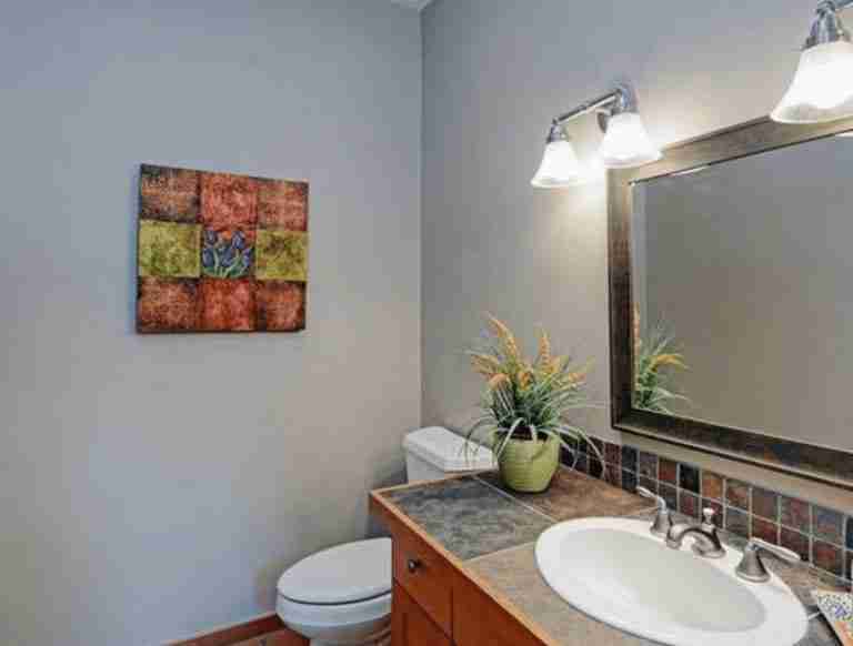 Complete Before and After Home Renovation . Photo of guest bathroom before the renovation