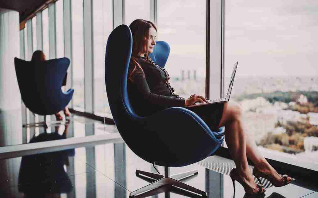 Caucasian businesswoman with laptop