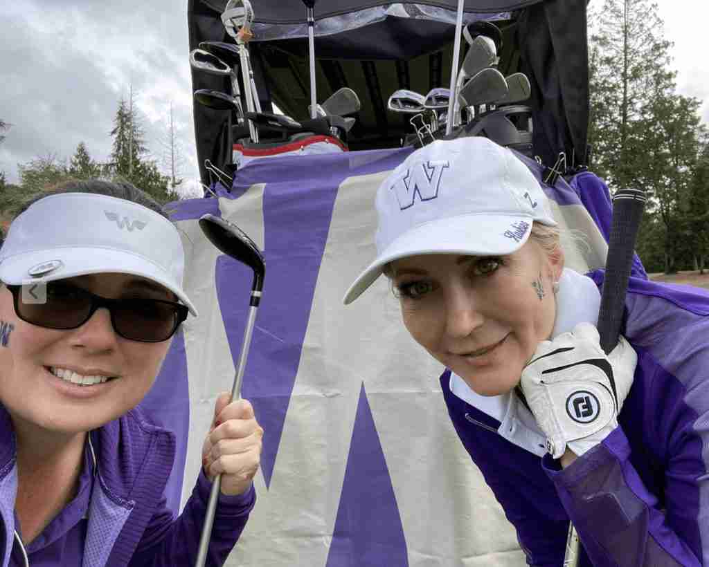 two women golfing