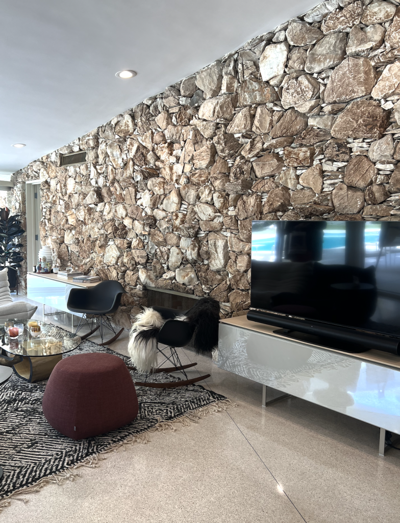 The family room in the home of tomorrow - stone wall 