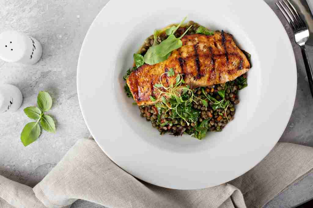 Grilled salmon with lentils and swiss chard