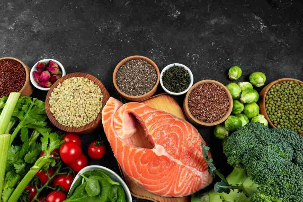 Set of healthy food. Selection of healthy eating fish, vegetables, beans, sources of omega 3