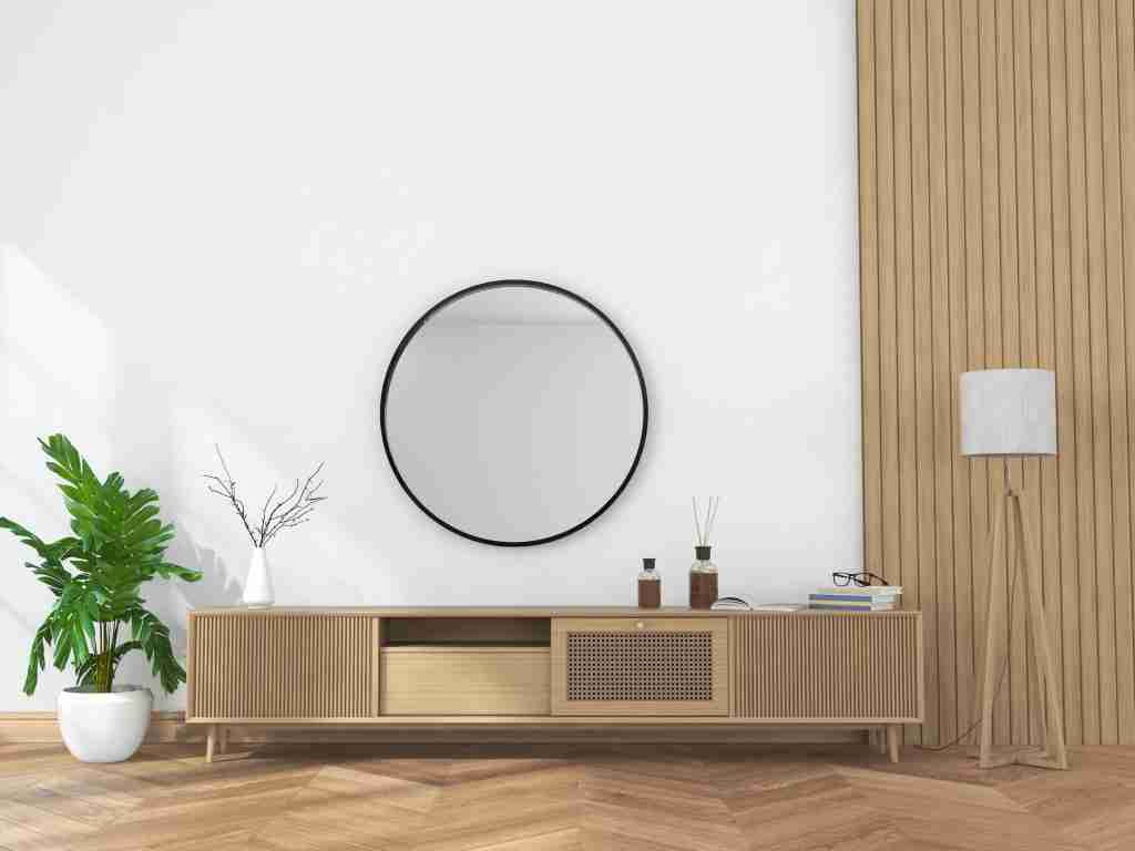 living room interior with wooden sideboard and round hanging mirror. 3D rendering