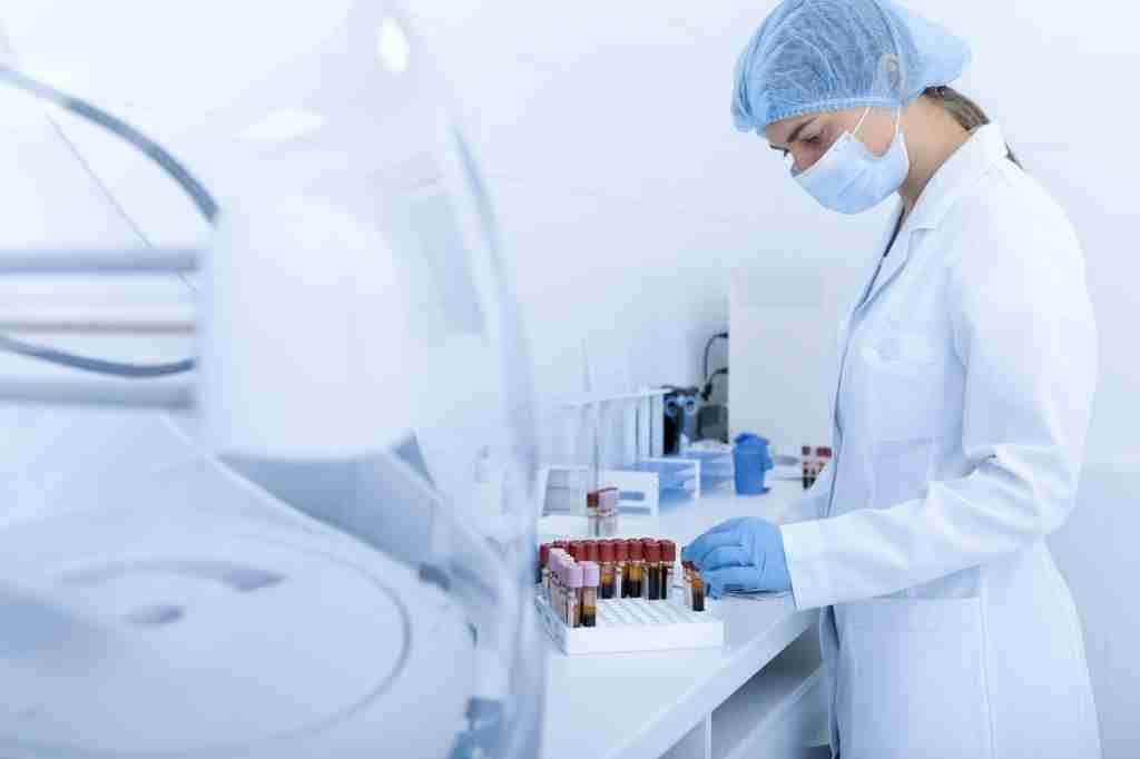 Woman collecting blood samples for testing on different diseases