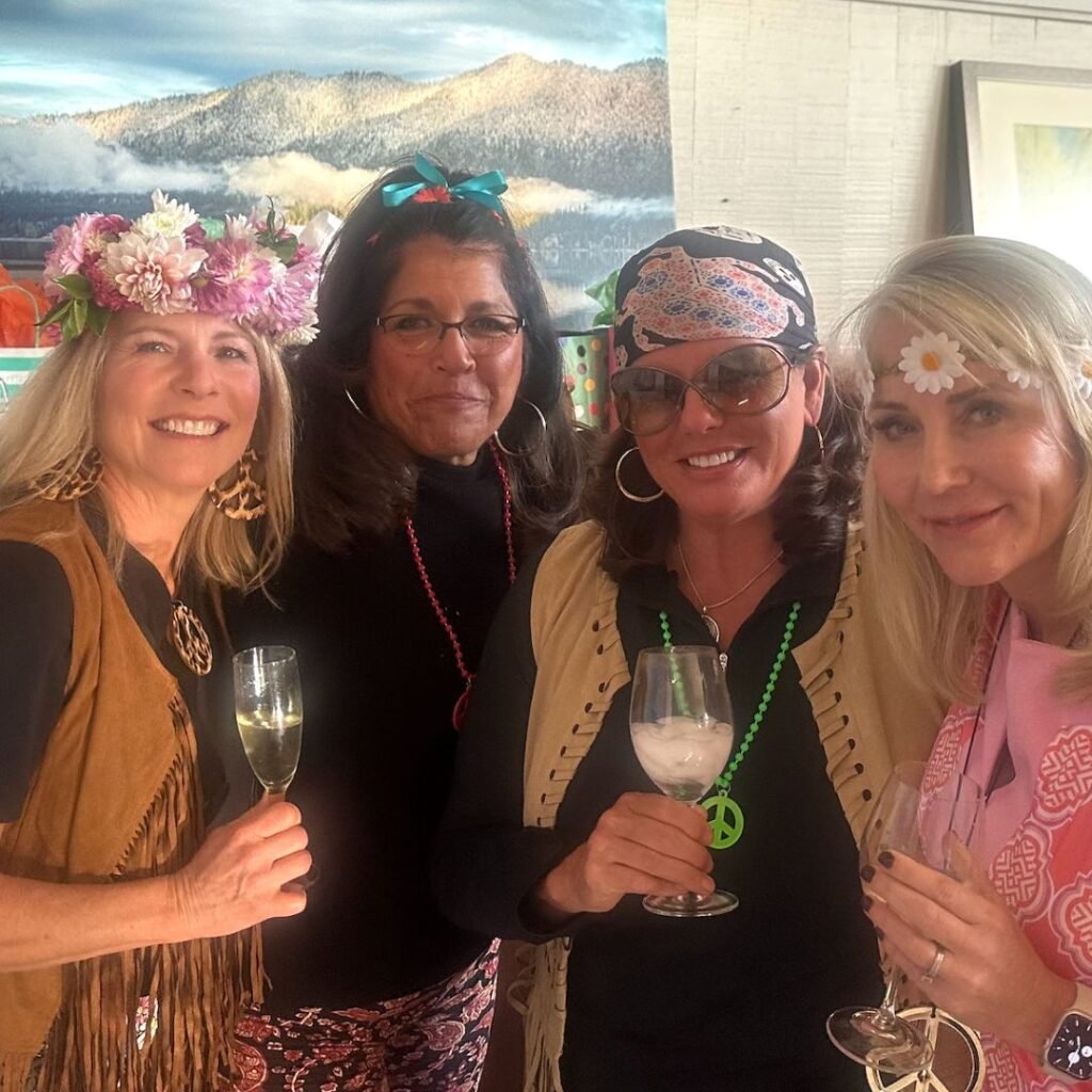 Four women in 60's costumes