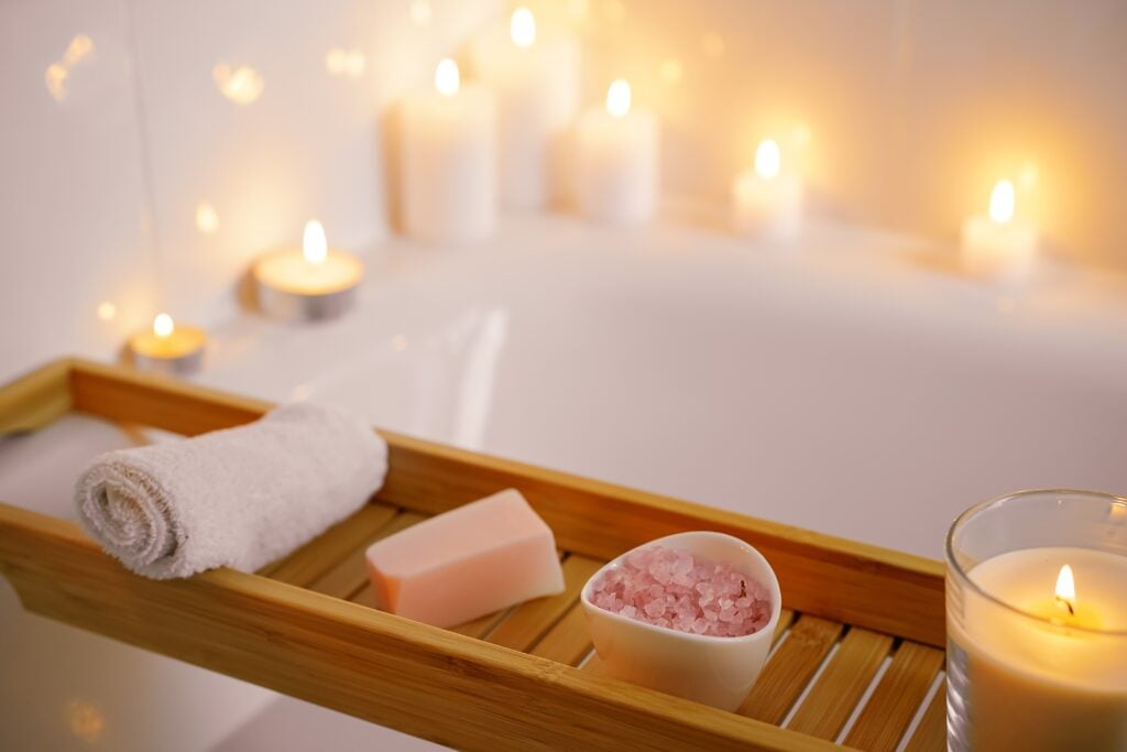 Spiritual aura cleansing ritual bath for full moon ritual with candles, aroma salt.