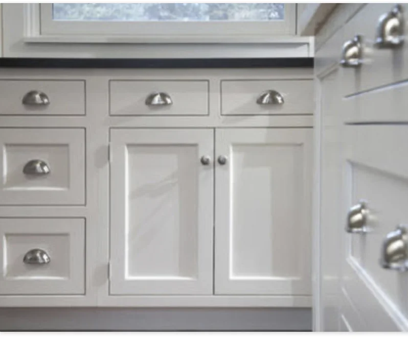 Stainless Steel Kitchen hardware pulls on white kitchen cabinets