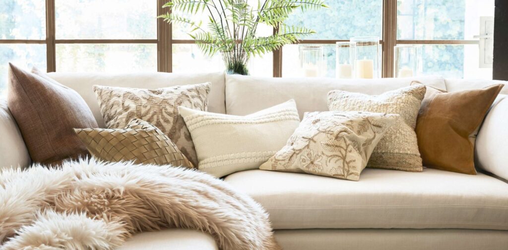 Neutrals pillows on a sofa