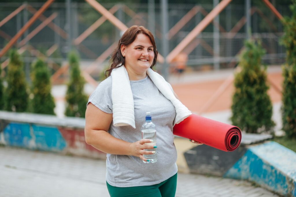 Embracing Happiness Overweight Woman's Post Workout Smile