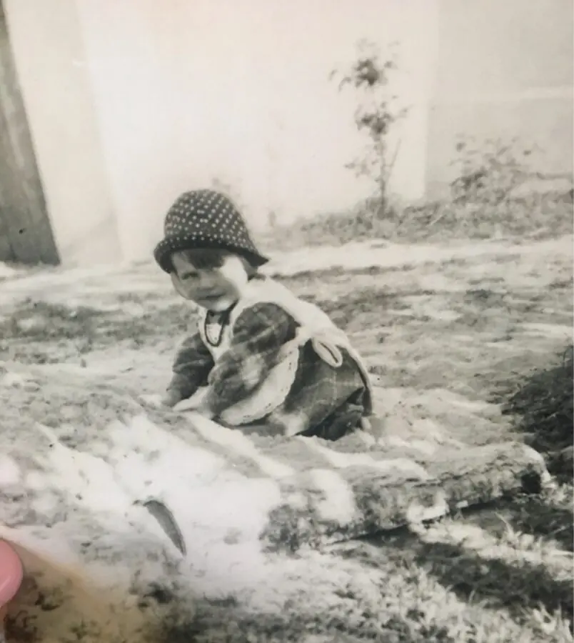 My sweet Mom as a small child digging in the Latvian garden in her backyard