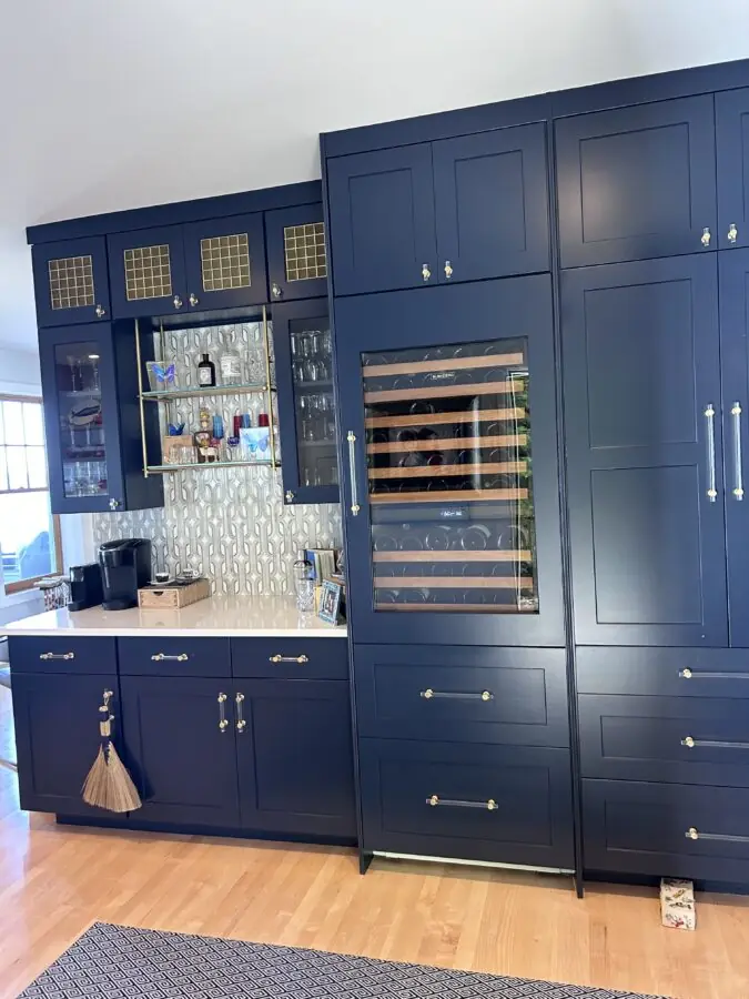Gorgeous Blue Painted kitchen cabinets and bar area.