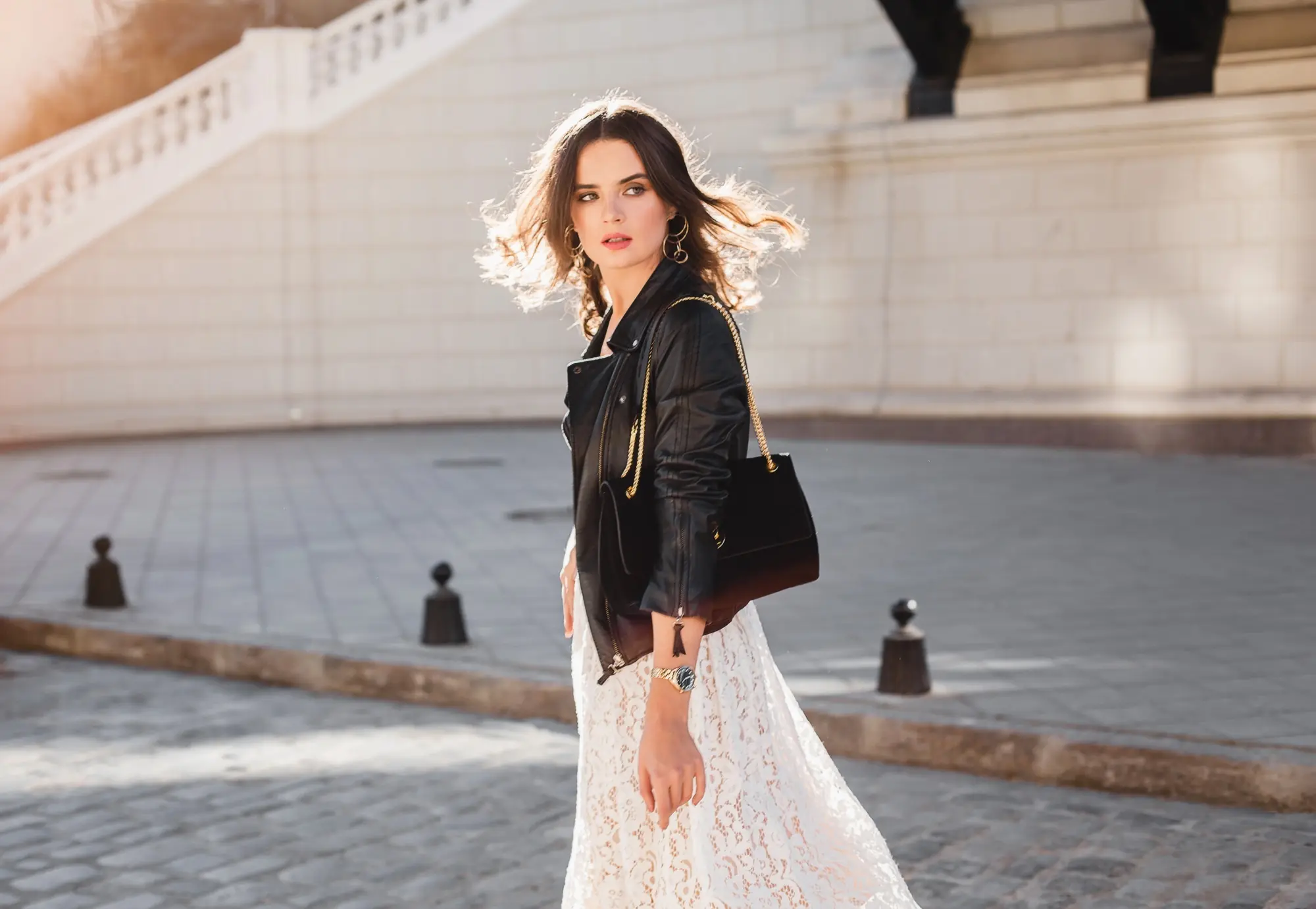 attractive woman walking in street in fashionable outfit