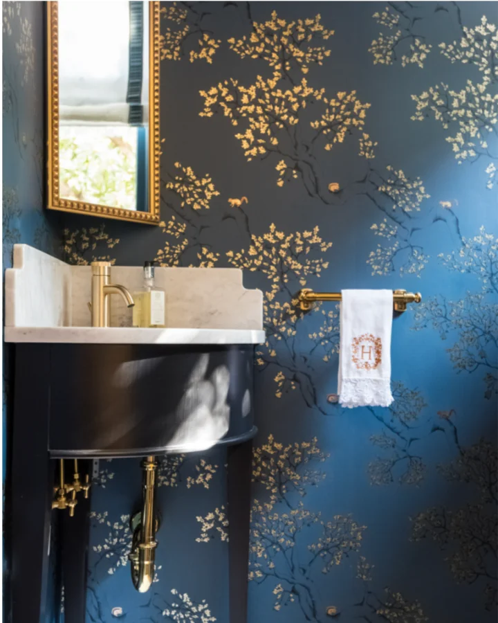 Blue wallpaper with gold flowers
