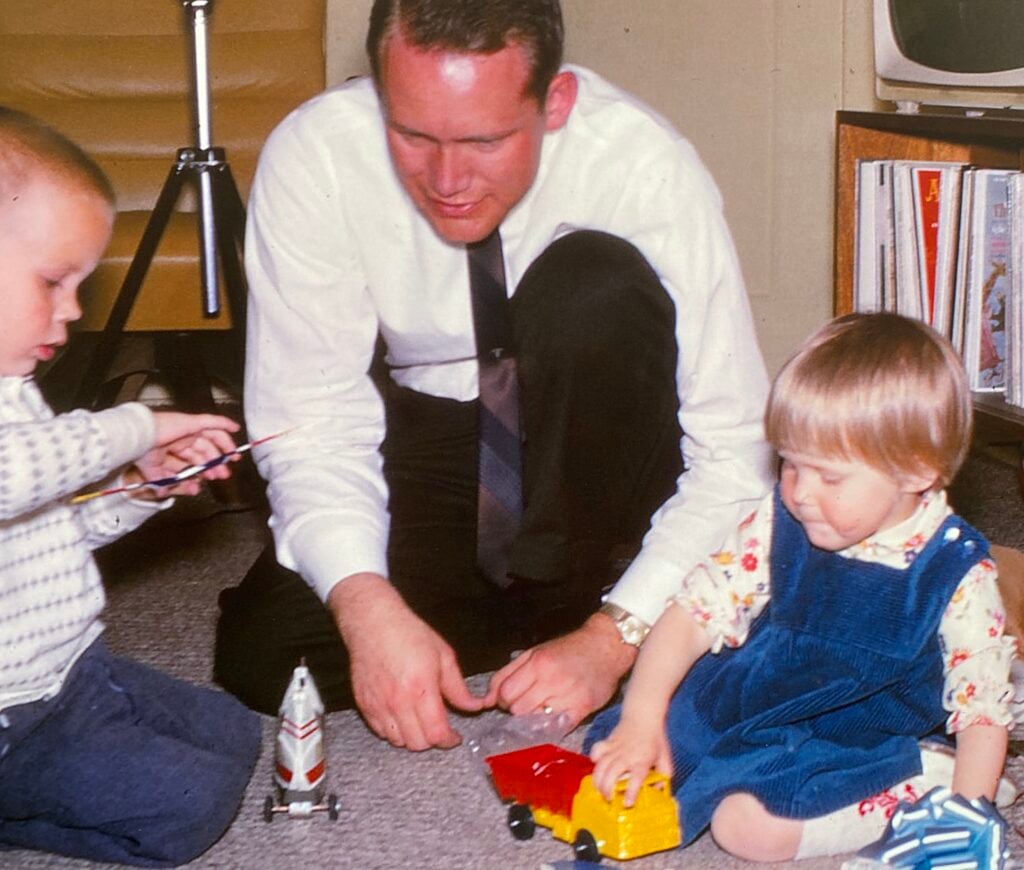 My father with my brother and myself
