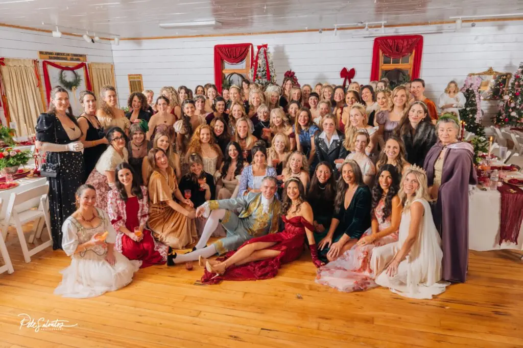 celebrating a Bridgerton holiday party with all the details included. The group of women who attended