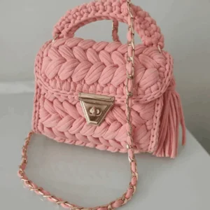 Pink Add a touch of effortless charm to any outfit with this handmade woven cream handbag, meticulously crocheted in Turkey from soft, premium cotton yarn. Its intricate texture and timeless design make it a true standout — a best-seller for good reason. This handbag does with any outfit from jeans to a evening gown.