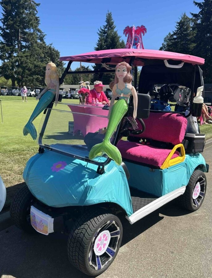 Blue and pink barbie golf cart